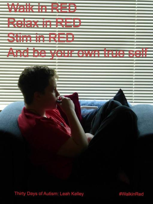 #WalkinRed Image description: H wearing a red shirt, chewing his stim necklace, sits relaxed and curled in a large armchair. Text reads: "Walk in RED, Relax in RED, Stim in RED, And be your own true self." 